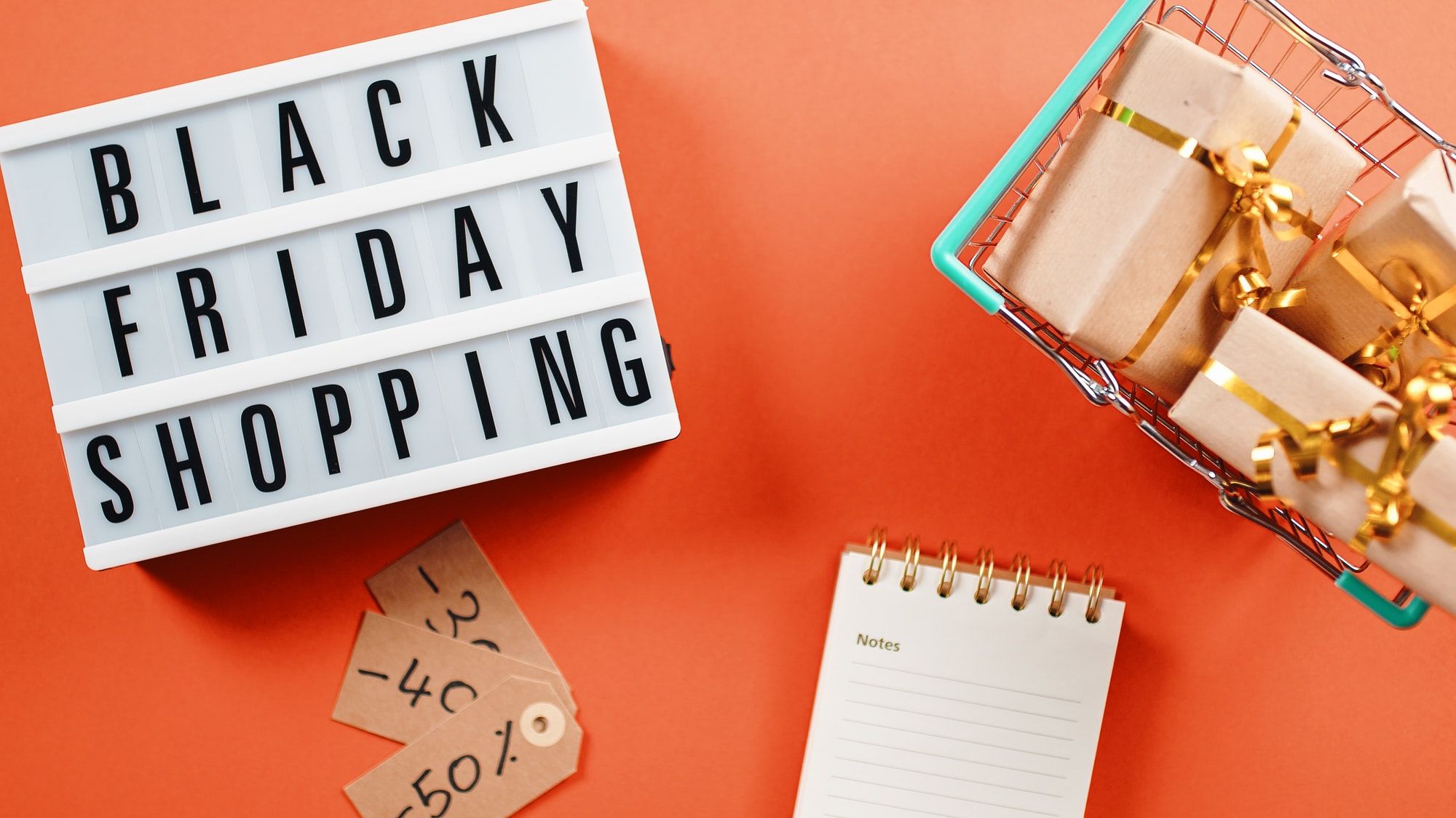 Black Friday shopping sign on orange baclground